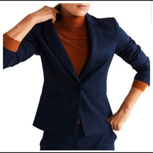 Women’s navy fitted suit. Brand new